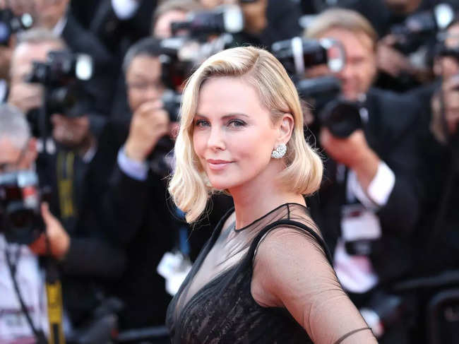 Charlize Theron shared her fond memories of Bollywood movies during the HT Leadership Summit in New Delhi.