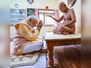 **EDS: IMAGE VIA @narendramodi** Dongargarh: Prime Minister Narendra Modi receiv...