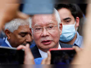 FILE PHOTO: Former Malaysian Prime Minister Najib Razak speaks to journalists outside the Federal Court during a court break, in Putrajaya
