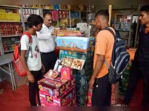 Prayagraj, Nov 05 (ANI): People shop for firecrackers for the upcoming Diwali fe...