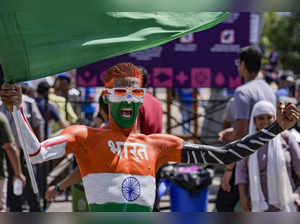 Ahmedabad: Cricket fans outside the Narendra Modi Stadium during the opening mat...