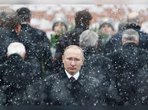 FILE PHOTO: Russian President Putin attends wreath laying ceremony to mark Defender of Fatherland Day at Tomb of Unknown Soldier by Kremlin wall in Moscow