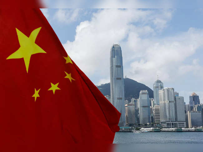 The Chinese national flag is seen in front of the financial district Central on the Chinese National Day in Hong Kong