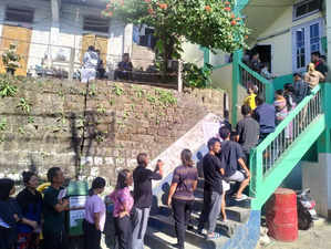 Mizoram, Nov 7 (ANI): Voters wait in a queue to cast their votes for the Mizoram...