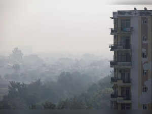 A view shows residential buildings shrouded in heavy smog in Lucknow