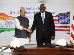 This handout photo taken and released on November 10, 2023, by the Indian Press Information Bureau (PIB) shows India's Defence Minister Rajnath Singh (L) shakes hands with US Secretary of Defence Lloyd Austin during their bilateral meeting in New Delhi.