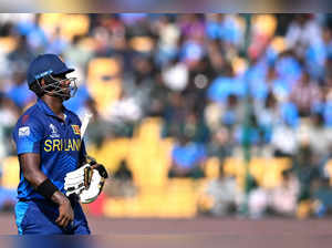 Sri Lanka's Angelo Mathews walks back to the pavilion after his dismissal during the 2023 ICC Men's Cricket World Cup one-day international (ODI) match between New Zealand and Sri Lanka at the M. Chinnaswamy Stadium in Bengaluru on November 9, 2023.