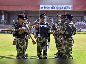 Jodhpur: Border Security Force (BSF) personnel perform a drill during Marwar Fes...