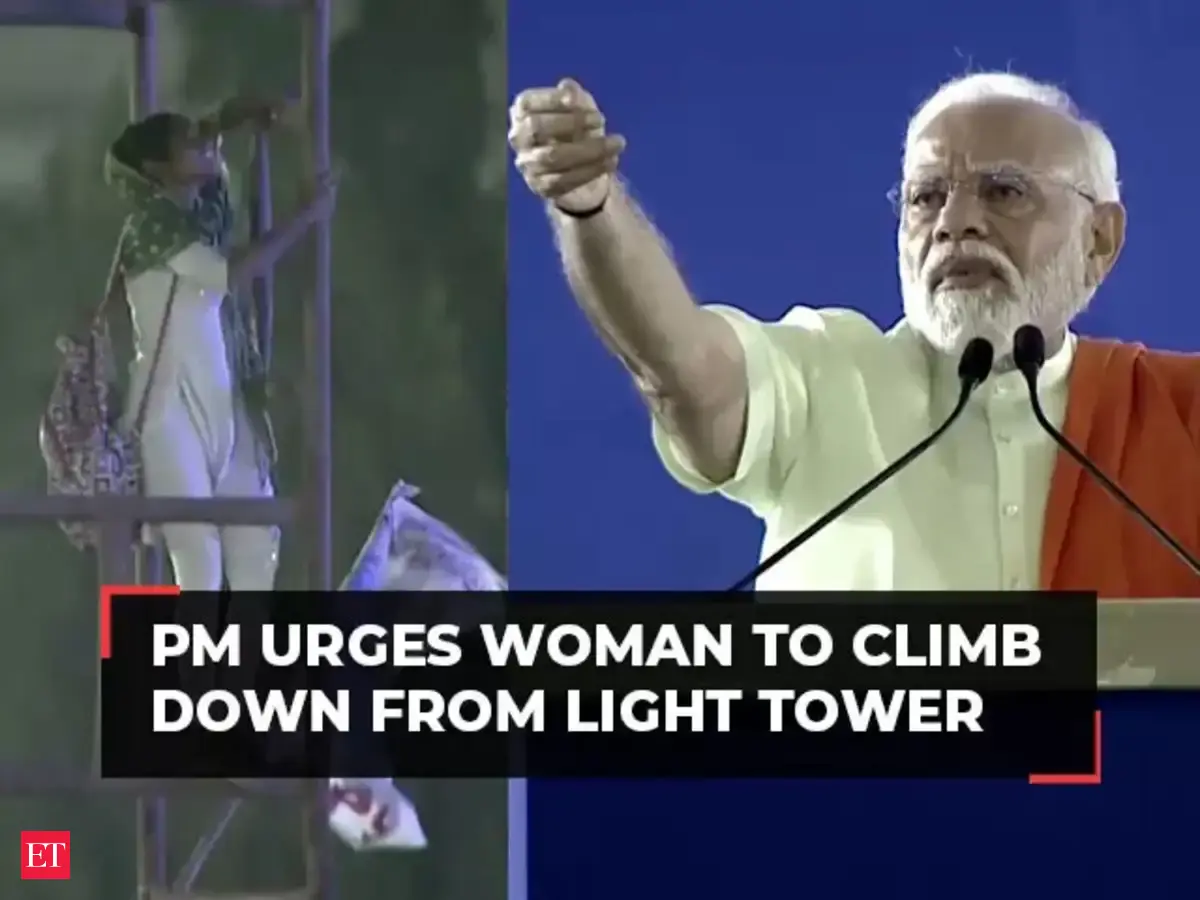 Viral video: PM Modi urges woman to climb down from light tower during ...