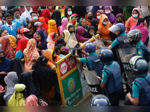 Garment industry workers continue to protest demanding a wage raise, in Dhaka