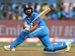India's captain Rohit Sharma plays a shot during the 2023 ICC Men's Cricket World Cup one-day international (ODI) match between India and Netherlands at the M. Chinnaswamy Stadium in Bengaluru on November 12, 2023.