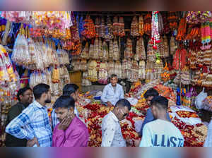 New Delhi: People shop for decorative items ahead of the Diwali festival, at Sad...