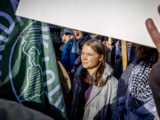 Greta Thunberg brushes off interruption at massive Dutch climate march days before election