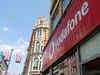 Vodafone drops into first-half net loss