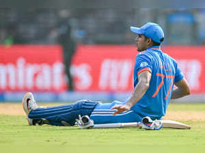 India's Shubman Gill reacts after a muscle cramp during the 2023 ICC Men's Cricket World Cup one-day international (ODI) first semi-final match between India and New Zealand at the Wankhede Stadium in Mumbai on November 15, 2023.