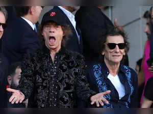 Members of the English rock band The Rolling Stones, Mick Jagger (L) and Ronnie Wood, attend the Spanish league football match between FC Barcelona and Real Madrid CF at the Estadi Olimpic Lluis Companys in Barcelona on October 28, 2023.