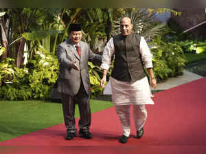 Indonesia's Defense Minister Prabowo Subianto (L) greets India’s Defense Minister Rajnath Singh upon arrival for the 10th Association of Southeast Asian Nations (ASEAN) Defence Ministers' Meeting (ADMM) Plus in Jakarta on November 16, 2023.