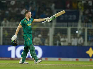 Kolkata: South Africas David Miller celebrates his century during the ICC Men's...