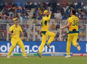Kolkata, Nov 16 (ANI): Australia's Mitchell Starc and Josh Hazlewood celebrate t...