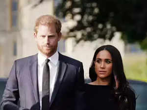Prince Harry and Meghan Markle are "desperate" to keep their royal ties for financial gain