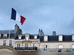 A French national flag flies above the Elysee Palace in Paris
