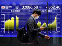 Nikkei falls from 33-year high as sharp gains stoke caution