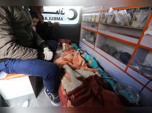 Premature babies, who were evacuated from Al Shifa hospital, lie in an ambulance before they are transported for treatment in UAE, at Rafah border crossing with Egypt, in Rafah