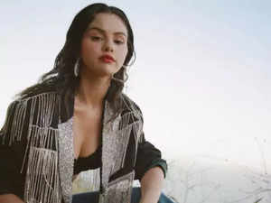 Selena Gomez attends the 2023 Billboard Music Awards wearing crocheted flowers