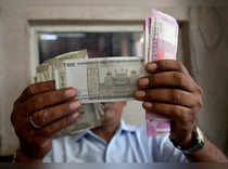 Rupee troubled by "unabated" importer orders; premiums rise