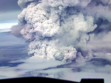 Eruption of Papua New Guinea volcano subsides though thick ash is billowing 3 miles into the sky