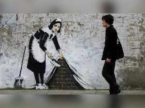 Mysterious street artist  Banksy confirms his first name in BBC interview