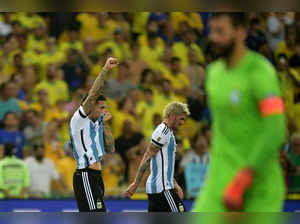 Argentina's defender Nicolas Otamendi (L) celebrates after scoring during the 2026 FIFA World Cup South American qualification football match between Brazil and Argentina at Maracana Stadium in Rio de Janeiro, Brazil, on November 21, 2023.