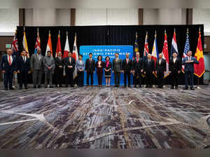 Secretary of Commerce Gina Raimondo and US Trade Representative Katherine Tai, center, and economic leaders pose for a group photo during the Indo-Pacific Economic Framework and Prosperity ministerial during the Asia-Pacific Economic Cooperation (APEC) summit at Mariott Marquis on November, 14, 2023 in San Francisco, California.