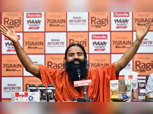 New Delhi, June 16 (ANI): Yoga guru Ramdev addresses the media during a launch o...