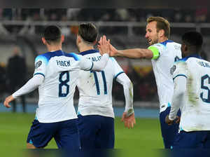 England's striker #20 Harry Kane (2R) celebrates a goal with England's midfielder #08 Phil Foden during the UEFA Euro 2024 group C qualification football match between North Macedonia and England at National Arena "Todor Proeski" in Skopje on November 20, 2023.
