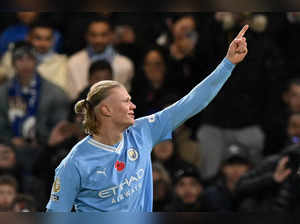 Manchester City's Norwegian striker #09 Erling Haaland celebrates after scoring their third goal during the English Premier League football match between Chelsea and Manchester City at Stamford Bridge in London on November 12, 2023.