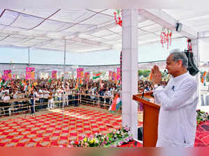 Pali, Nov 22 (ANI): Rajasthan Chief Minister Ashok Gehlot greets the gathering d...