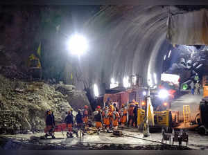 Members of the NDRF enter a tunnel with trapped workers, in Uttarkashi