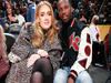 Adele flashes huge wedding ring at basketball game with husband Rich Paul