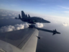 Chinese fighter jets 'orbit' Philippine patrol aircraft, Manila says