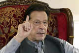 A Pakistani court orders public trial for imprisoned ex-premier Khan on charge of revealing secrets