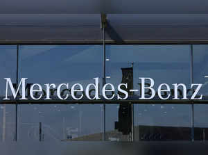 FILE PHOTO: The logo of Mercedes-Benz is seen outside a Mercedes-Benz car dealer in Brussels, Belgium