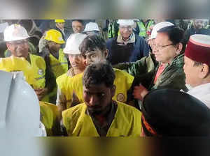Uttarkashi, Nov 28 (ANI): Uttarakhand CM Pushkar Singh Dhami meets the workers w...
