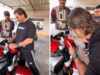 MS Dhoni cleans fan's superbike with his t-shirt before signing autograph, fans gush about Captain Cool's simplicity