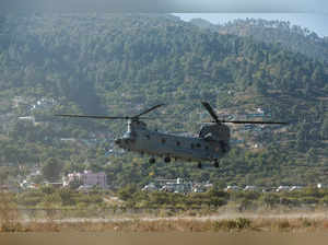Indian Air Force's Chinook helicopter airlifts workers, who were rescued from a tunnel which collapsed in Uttarkashi, to AIIMS Rishikesh hospital, in Chinyalisaur