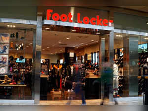 FILE PHOTO: Customers walk by the Foot Locker store in Broomfield