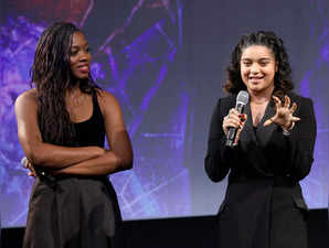 Nia DaCosta and Iman Vellani speak onstage during THE MARVELS Fan Screening Surprise Talent Appearance at El Capitan Theatre in Hollywood, California on November 09, 2023.