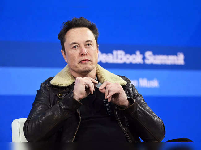Elon Musk wears a necklace in honor of Israeli hostages onstage during The New York Times Dealbook Summit 2023 at Jazz at Lincoln Center on November 29, 2023 in New York City.