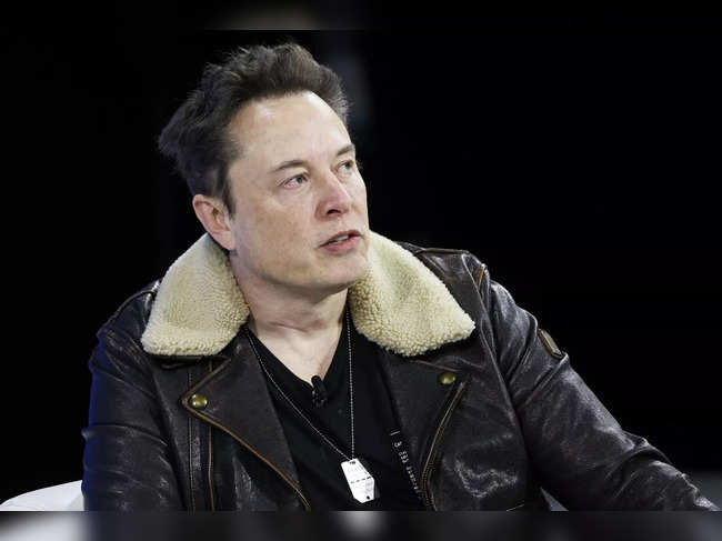 Elon Musk speaks during the New York Times annual DealBook