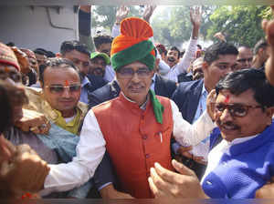 Bhopal: Madhya Pradesh Chief Minister Shivraj Singh Chouhan with BJP workers dur...